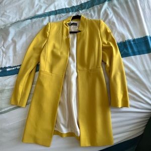 Brand new long coat/blazer that looks new and only wore once for a photo shoot.